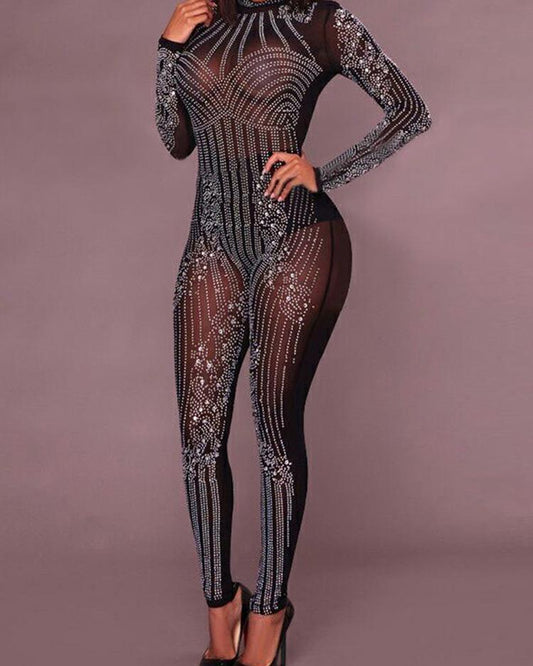 EMBELLISHED MESH JUMPSUIT WITH GLITTER IN BLACK