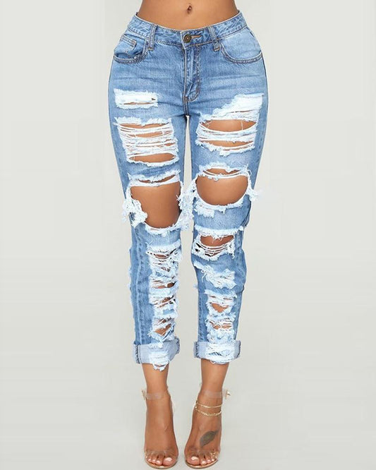 "CUT IT OUT" RIPPED JEANS