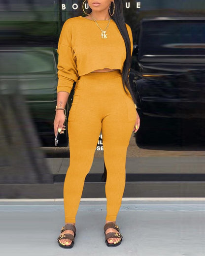 "2 PIECE" LONG SLEEVE TOP AND MATCHING PANT SET IN BLACK