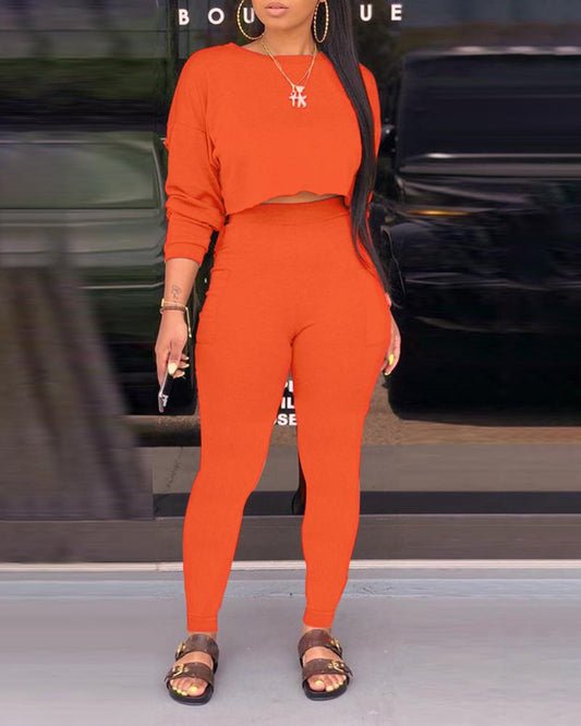 "2 PIECE" LONG SLEEVE TOP AND MATCHING PANT SET IN ORANGE